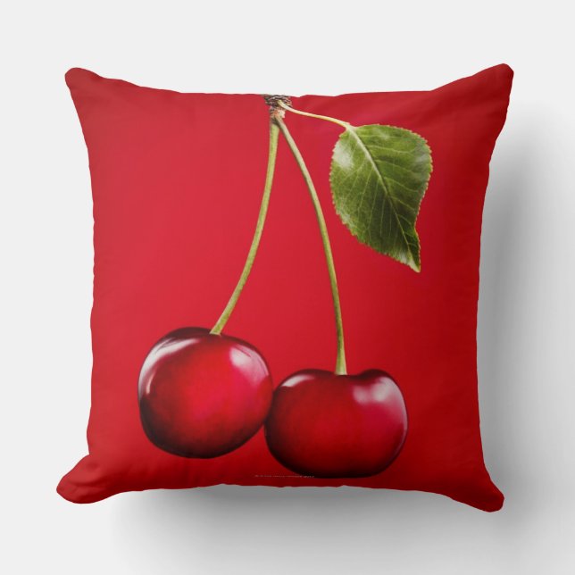 Coussin Cerises avec la feuille sur l'arrière - plan rouge (Recto)