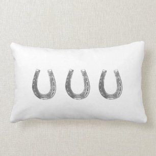 Coussin chanceux de fers à cheval