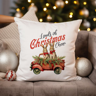 Coussin Charges de lapins de Noël en Camion Rouge