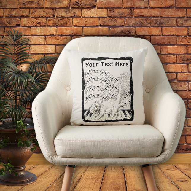 Coussin Chat blanc sur piano Musique Note Barres Cadre (White Winking cat on piano bars of music notes in black and white frame on decorative pillow.)