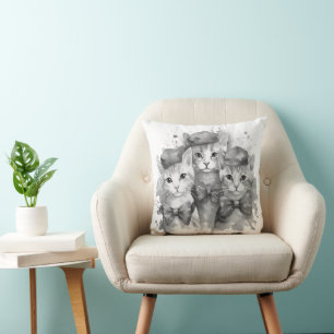 Coussin Chatons noirs et blancs avec arcs et casquette