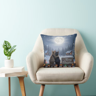 Coussin Chats de Noël s'étreignant sur une clôture enneigé