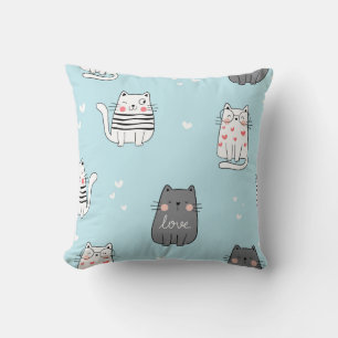 Coussin Chats joueurs sur Motif bleu