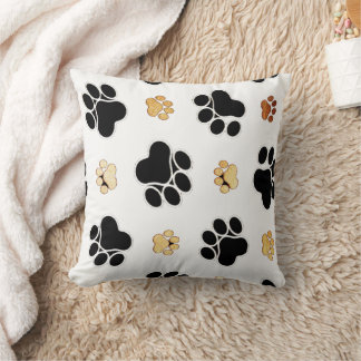 Coussin Chien canin noir et tan empreinte de patte blanc