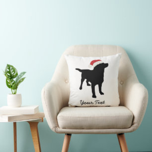Coussin Chien de laboratoire noir avec chapeau de Noël