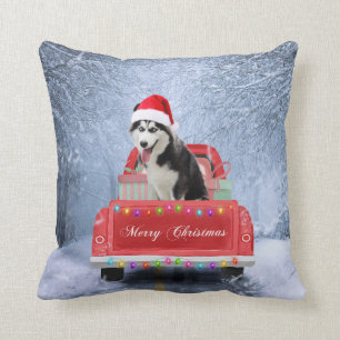 Coussin Chien sibérien Husky en neige assis Camion de Noël