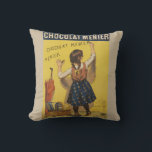 Coussin Chocolat Menier Petite fille Mur écriture<br><div class="desc">Cette image frappante est une image antique de la fin des années 1800 montrant une fille qui pratique son écriture de chocolat sur le mur. Voici une image Vintage d'affiche publicitaire datant de 1892. Menier est une société française de chocolat.</div>
