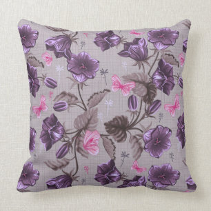 Coussin cloches de main violettes et motif de papillons