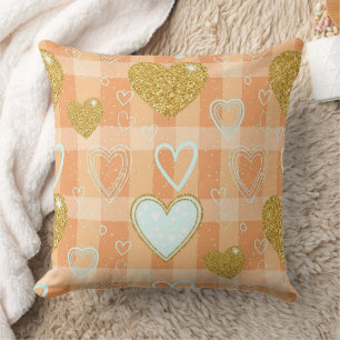 Coussin Cœur rayé pastel orange avec accents dorés