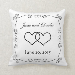 Coussin Coeurs enclenchés - noirs et blancs