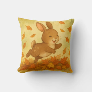 Coussin Cojin saltando entre hojas