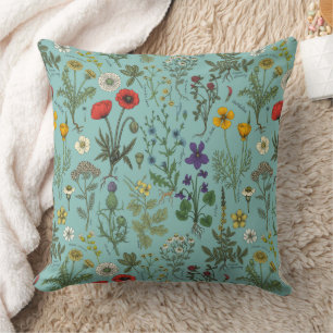 Coussin Collage de fleurs sauvages sur fond bleu