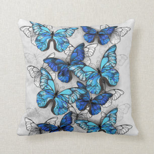 Coussin Composition des papillons blancs et bleus