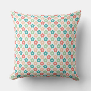 Coussin Conception de fleurs symétriques lumineuses sur fo