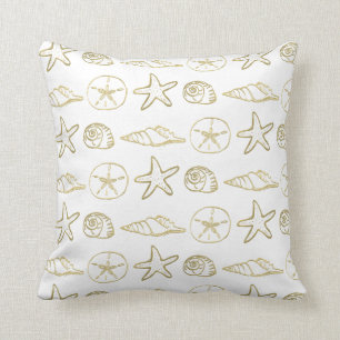 Coussin Coquilles de mer dorées élégantes plage blanche