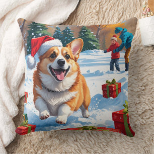Coussin Corgi courant dans la neige avec un chapeau de Noë