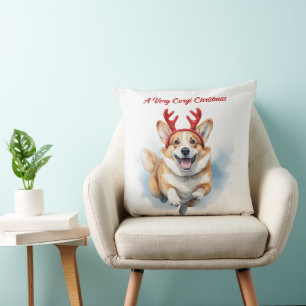 Coussin Corgi de Noël avec des bois de rennes bondissant