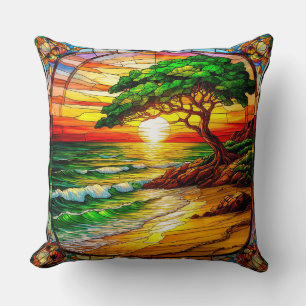 Coussin Coucher de soleil coloré en verre teinté sur la pl