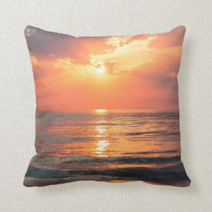 Coussin coucher de soleil sur l'eau