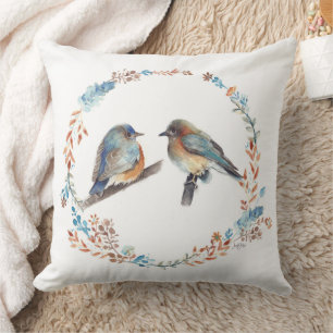 Coussin Courbe florale d'oiseaux bleus de l'Est