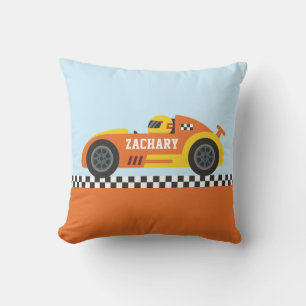 Coussin Coureur dans une voiture de course orange et jaune