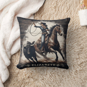 Coussin Cowgirl Roping Bull pendant la compétition de rodé