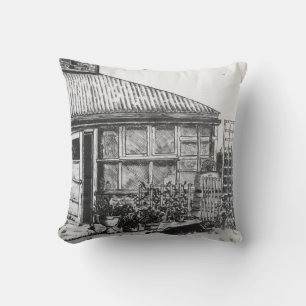 Coussin croquis de chien dans un jardin avec plantes et cl