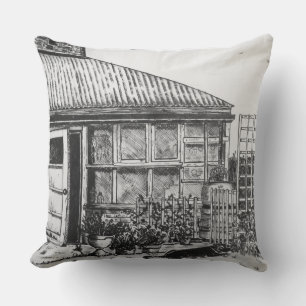 Coussin croquis de chien dans un jardin avec plantes et cl