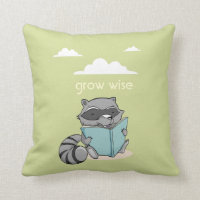 Cute raccoon reading à book. Green children pillow