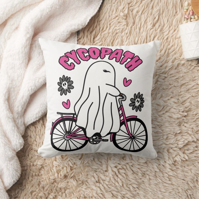 Coussin Cycopath Halloween fantôme sur vélo rose (Couverture)