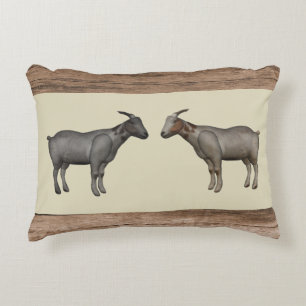 Coussin d'accents de chèvres rustiques et de grain