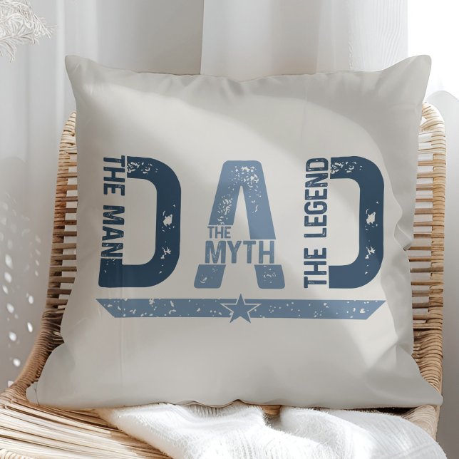 Coussin "DAD The Man Mith Legend" Fête des pères Cadeau ("DAD The Man Mith Legend" Father's Day Gift Throw Pillow on a sunny neutral arm chair)