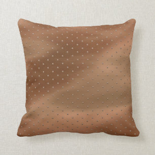 Coussin dans le regard perlé par bronze