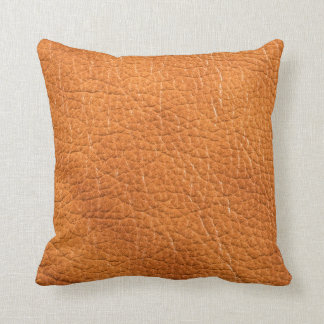 Coussin de cuir d'or