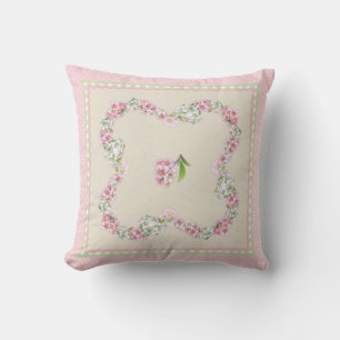 Coussin de fleurs de printemps rose et blanc
