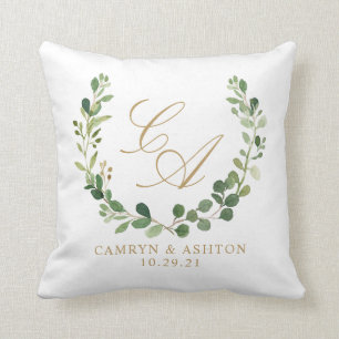 Coussin de guirlande de monogramme avec la verdure