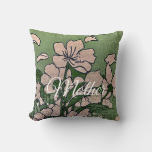 Coussin de jet vert à fleurs roses