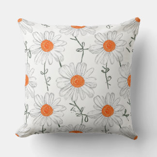 coussin de motif à fleurs blanches