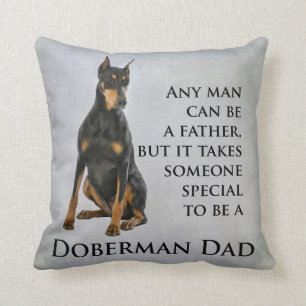 Coussin de papa de dobermann