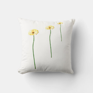 Coussin de trois fleurs de gerbera jaunes
