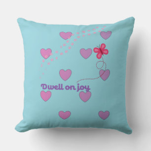 coussin décoratif avec joie cœurs et empreintes de