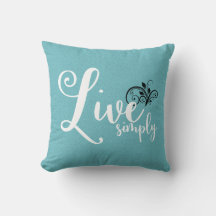 Coussin décoratif de style ferme avec le texte "Vi