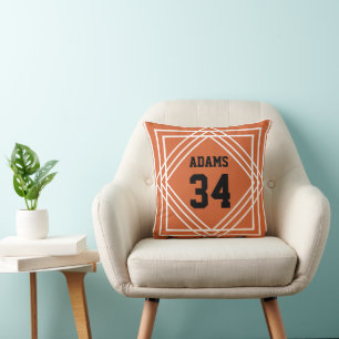 Coussin décoratif orange et blanc