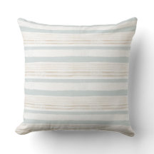 Coussin décoratif rayé blanc et neutre
