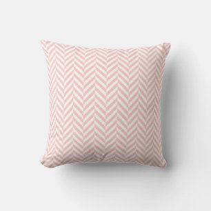 Coussin décoratif rose blush à motif en chevron
