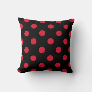 Coussin décoration à points rouges
