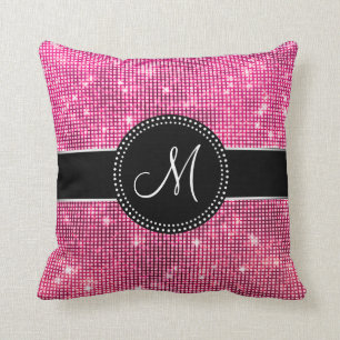 Coussin décoré d'un monogramme d'étincelles