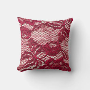 Coussin Dentelle rouge : textile jacquard élastique.