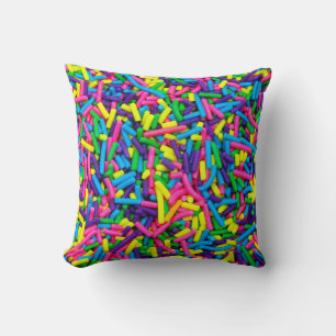 Coussin Des bonbons colorés arrosent l'oreiller