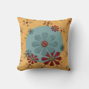 Coussin des fleurs de boutons de pays
